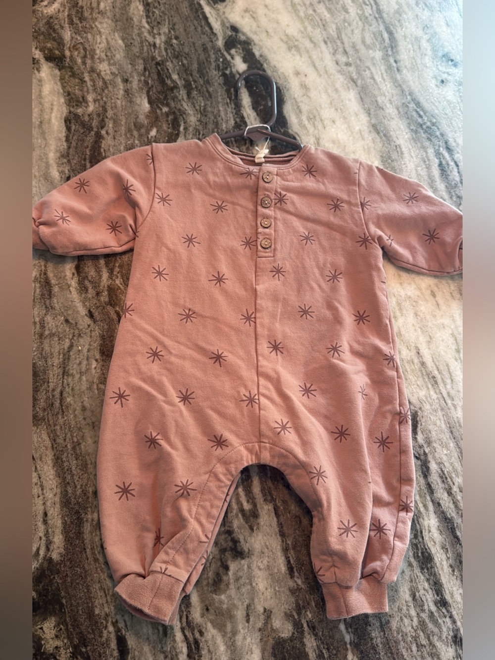 Quincy Mae Dusty Rose Star-Print onesie.